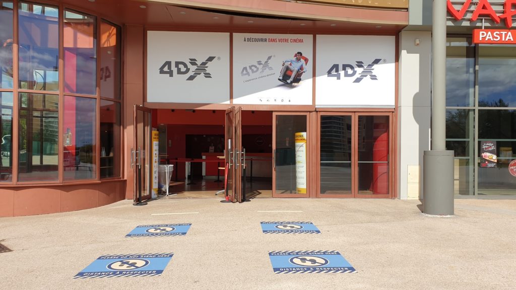 At the entrance to the cinema, markings have been placed on the floor for social distancing.