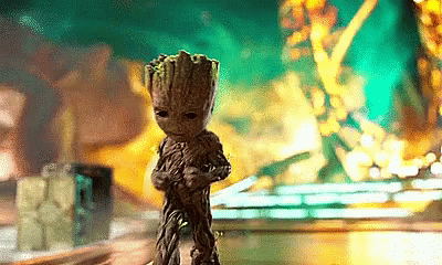 Groot avoids burning objects that fall on him
