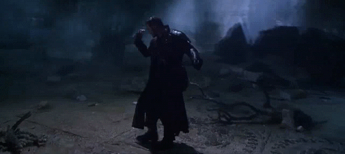 Star lord dances in the rain in the middle of a ruined field