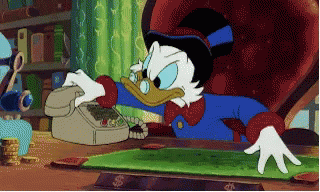 Unhappy, Scrooge hangs up his phone