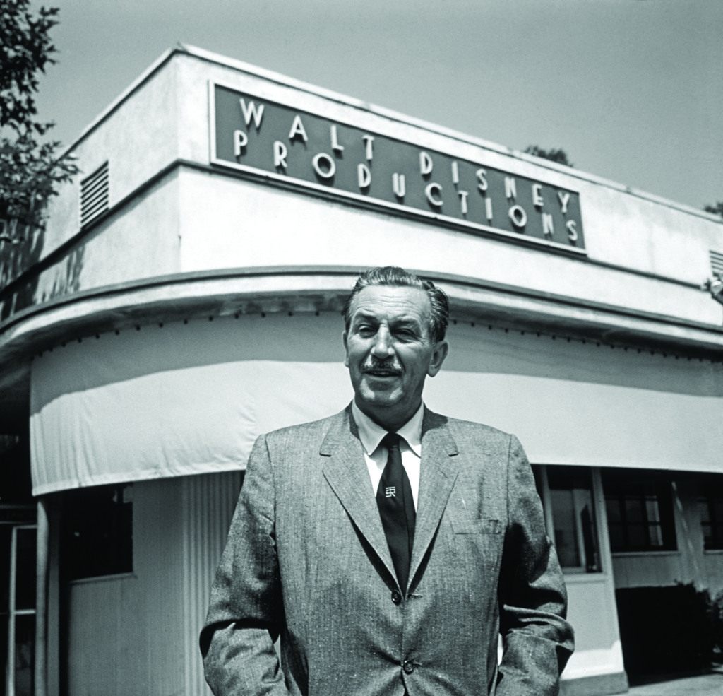 Walt Disney in front of his studio